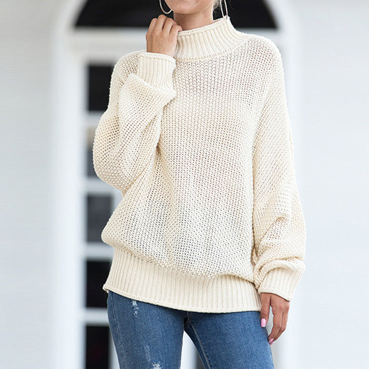 Dam chunky stickad tröja med hög krage och vida ärmar Mirla-Eva Jonsson