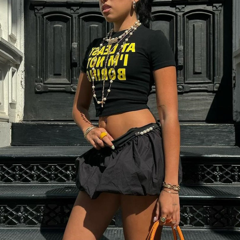Dam cropped T-shirt med iögonfallande typografi-tryck Mirla-Eva Jonsson