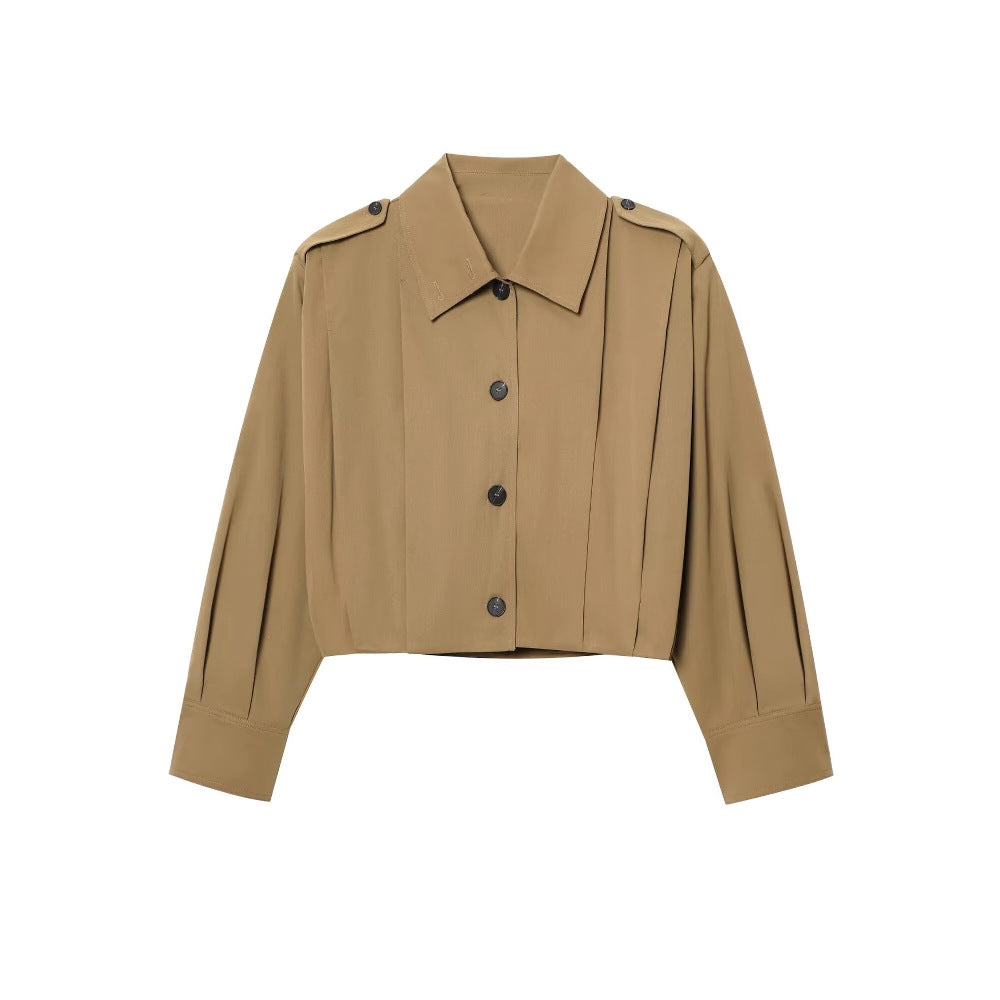 Dam elegant cropped jacka med sidofållar och praktiska knappar Mirla-Eva Jonsson