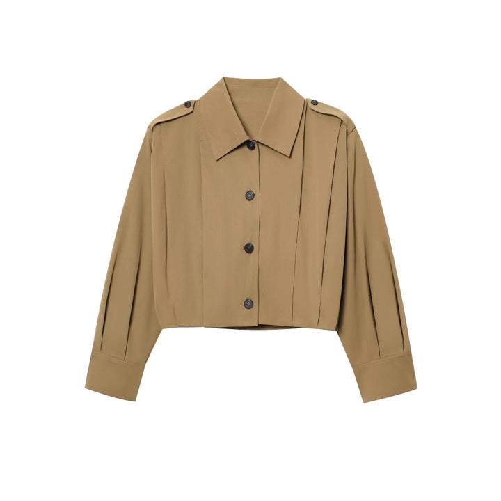Dam elegant cropped jacka med sidofållar och praktiska knappar Mirla-Eva Jonsson