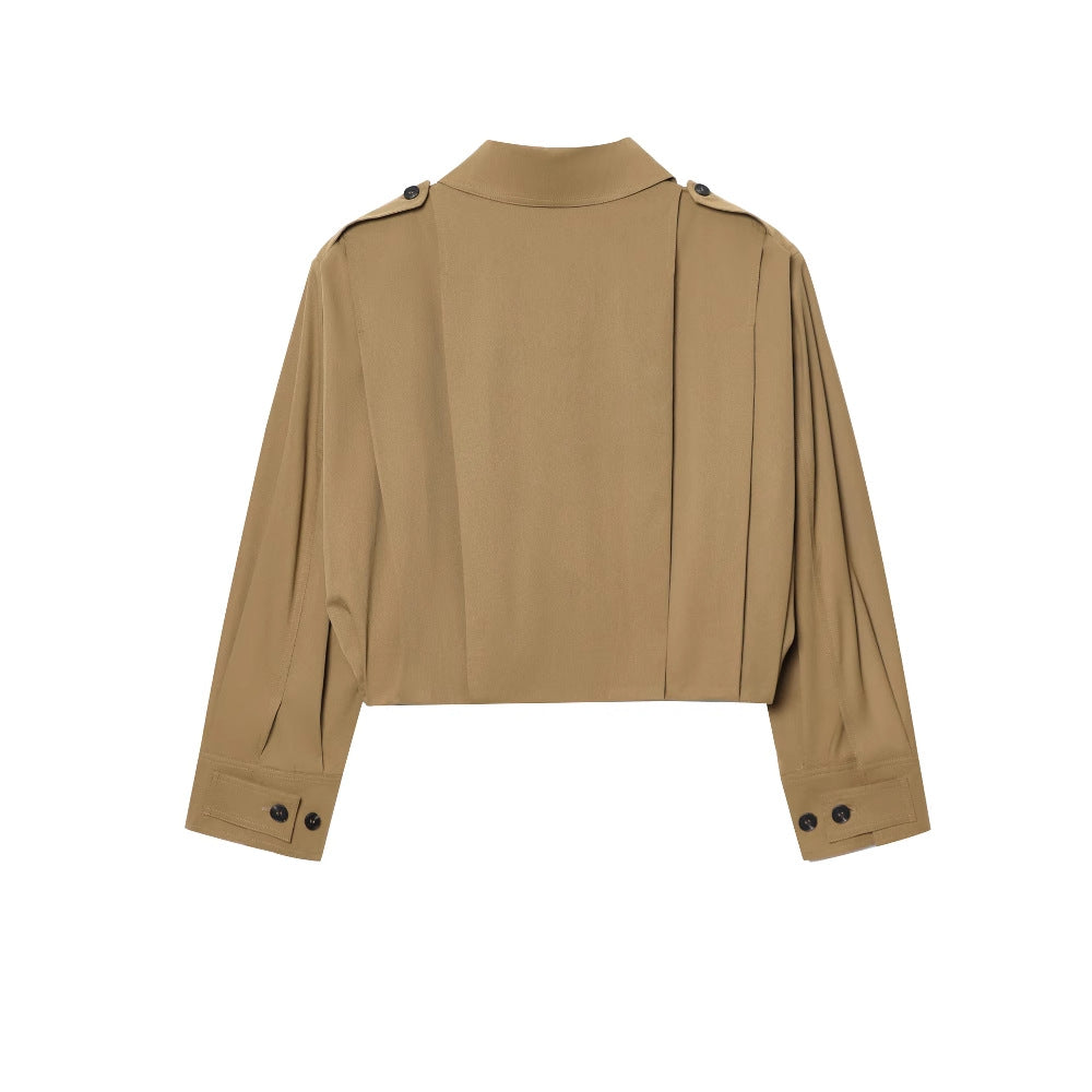 Dam elegant cropped jacka med sidofållar och praktiska knappar Mirla-Eva Jonsson