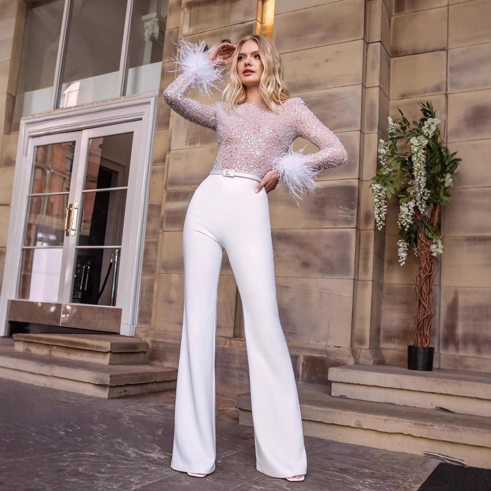 Dam elegant glittrande topp med extravaganta ärmdetaljer Mirla-Eva Jonsson