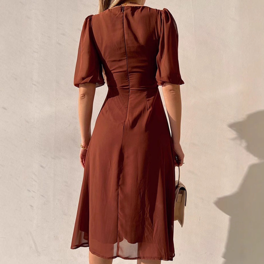 Dam elegant maxiklänning med puffärmar och djup slits Mirla-Eva Jonsson