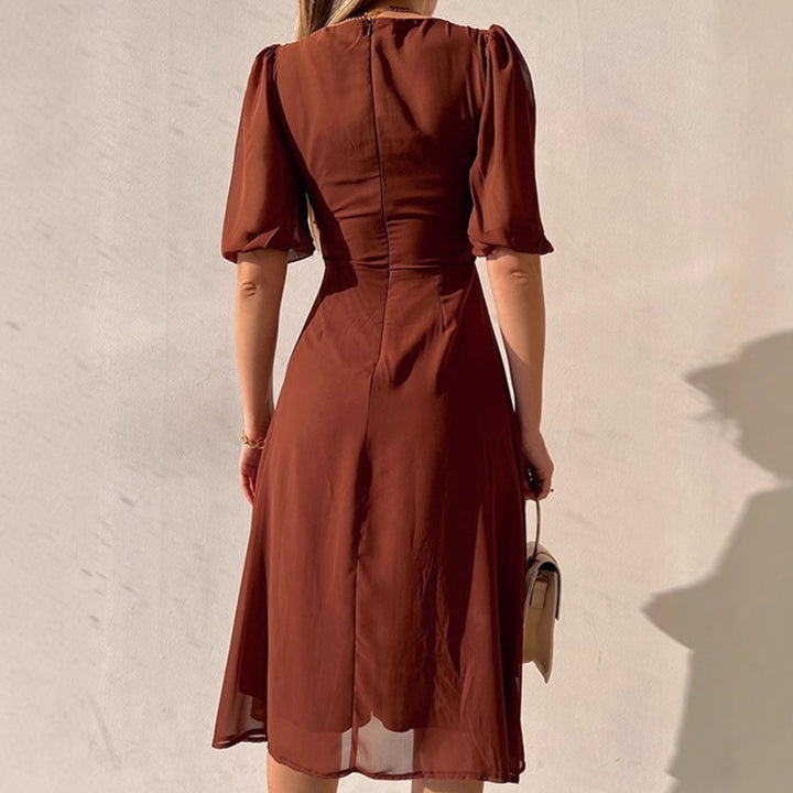Dam elegant maxiklänning med puffärmar och djup slits Mirla-Eva Jonsson