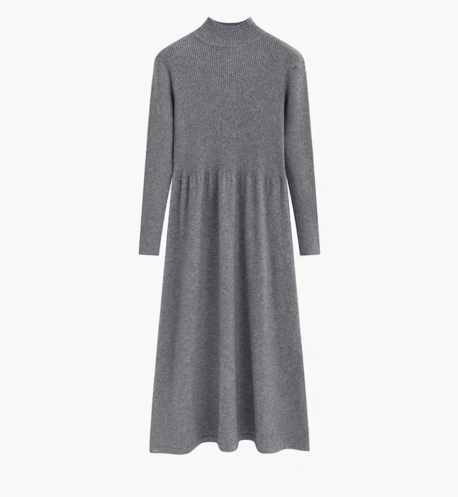 Dam elegant stickad klänning med hög krage och vid skärning Mirla-Eva Jonsson