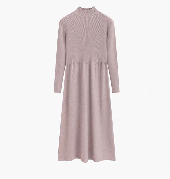Dam elegant stickad klänning med hög krage och vid skärning Mirla-Eva Jonsson