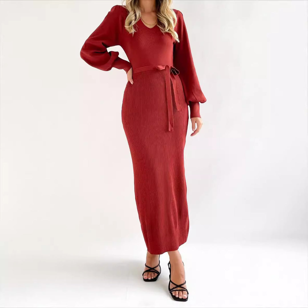 Dam elegant stickad klänning med puffärmar Mirla-Eva Jonsson