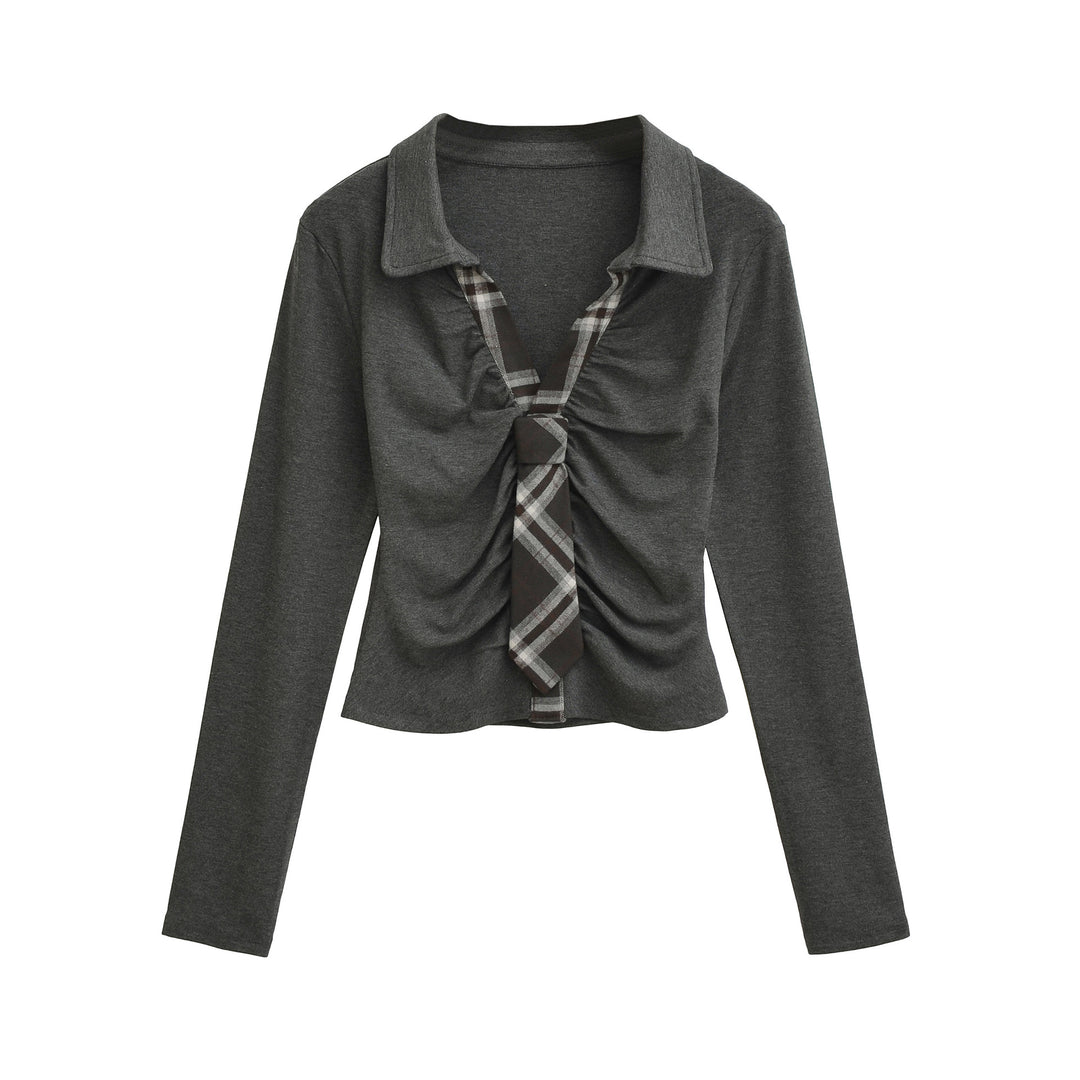 Dam elegant topp med raffinerad drapering och smakfulla rutdetaljer Mirla-Eva Jonsson