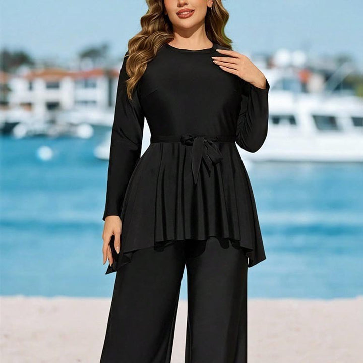 Dam elegant tvådelad jumpsuit med omslagsdesign Mirla-Eva Jonsson