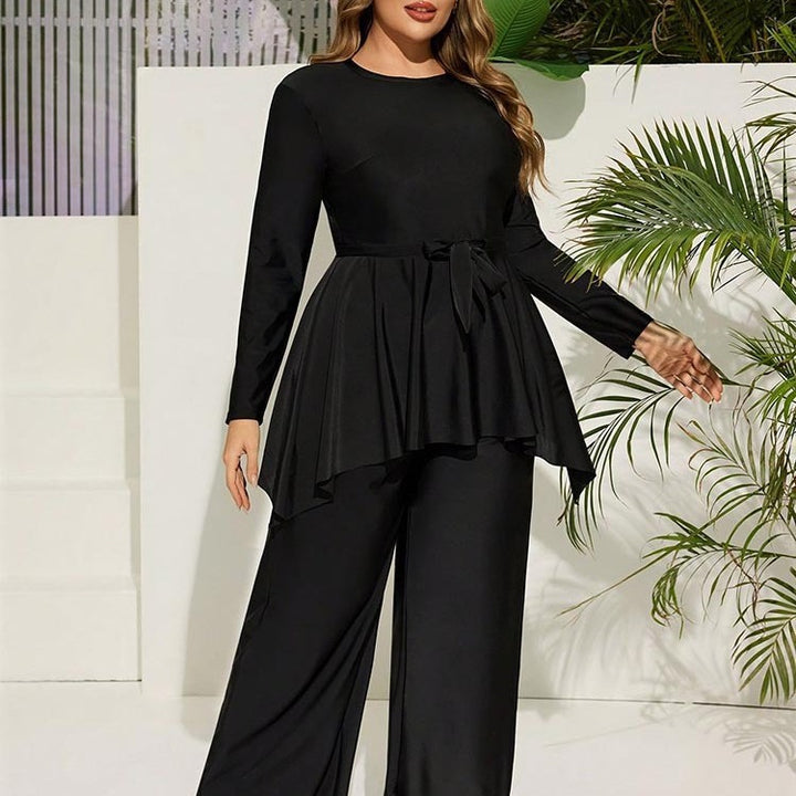 Dam elegant tvådelad jumpsuit med omslagsdesign Mirla-Eva Jonsson
