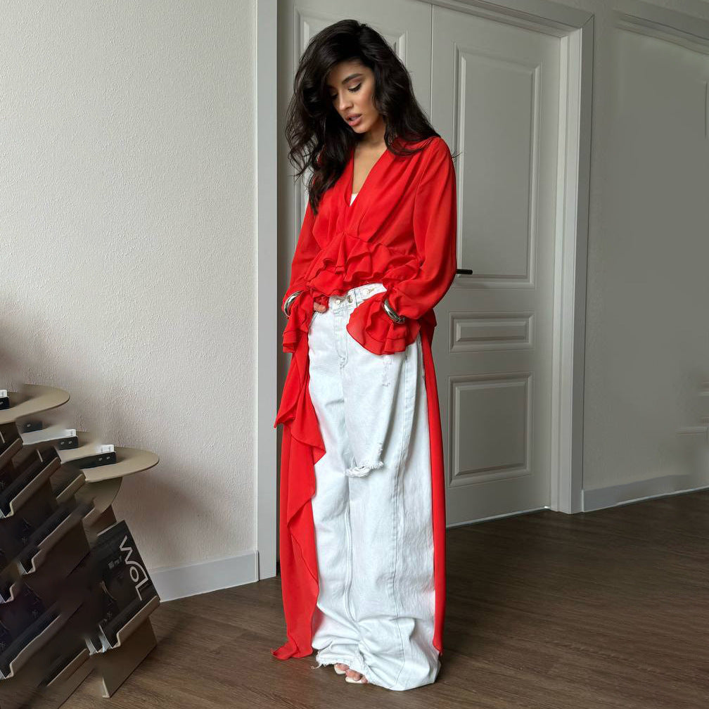 Dam eleganta maxiklänning med voluminösa volangdetaljer Mirla-Eva Jonsson