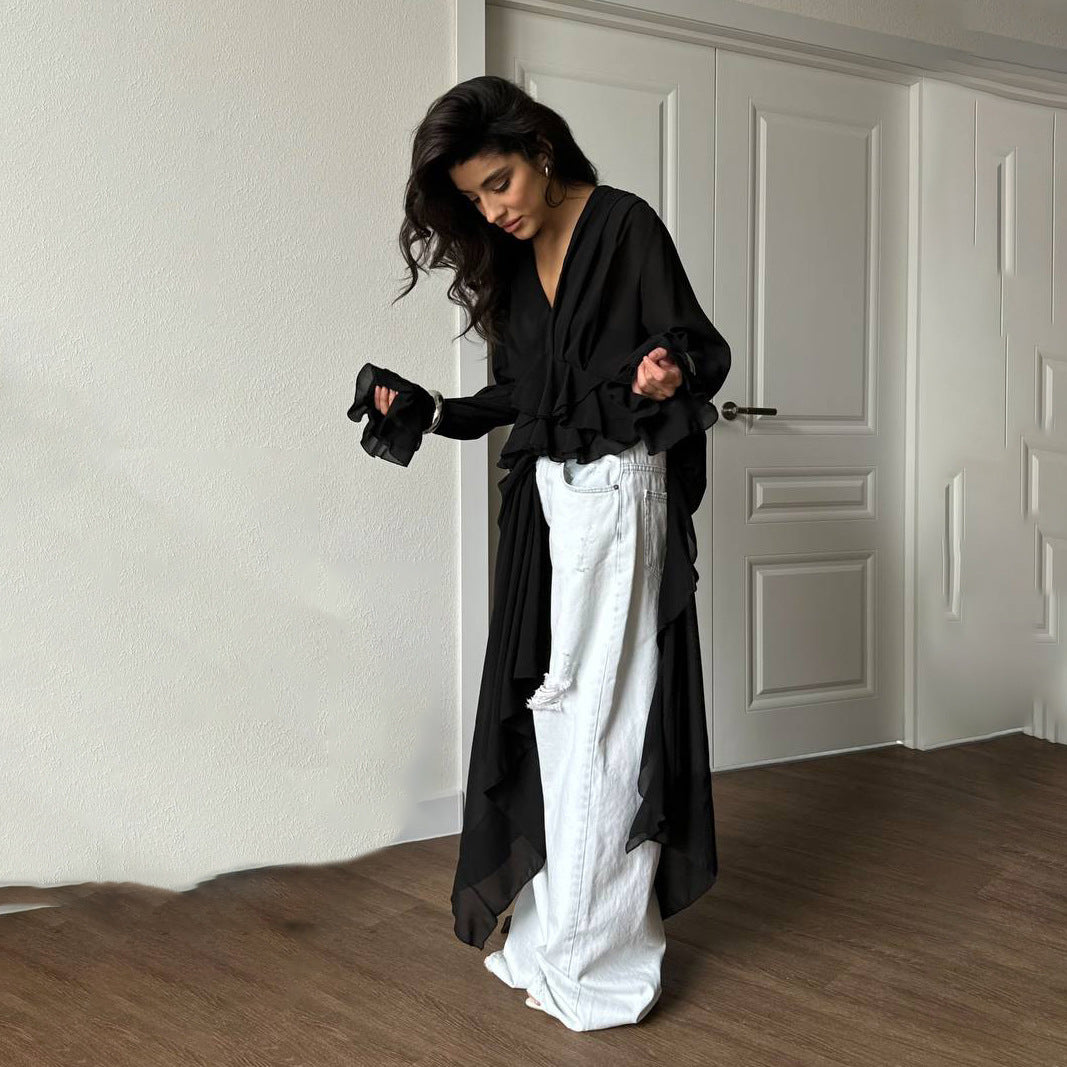 Dam eleganta maxiklänning med voluminösa volangdetaljer Mirla-Eva Jonsson