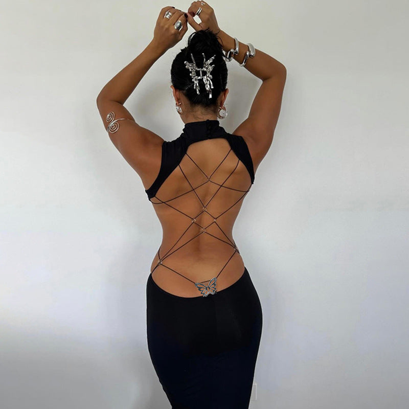 Dam figurformande aftonklänning med ståkrage och cut-outs Mirla-Eva Jonsson