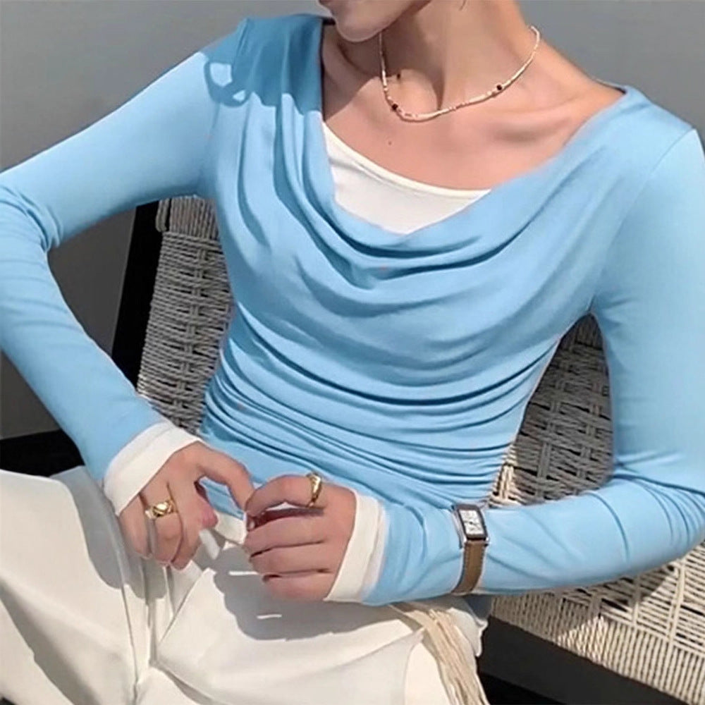 Dam figurformande långärmad med elegant rynkeffekt och djup urringning Mirla-Eva Jonsson