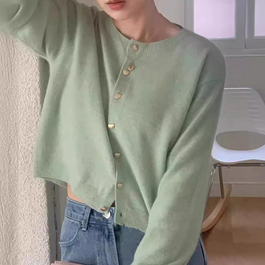 Dam finstickad cardigan med dekorelement och stilren klippning Mirla-Eva Jonsson