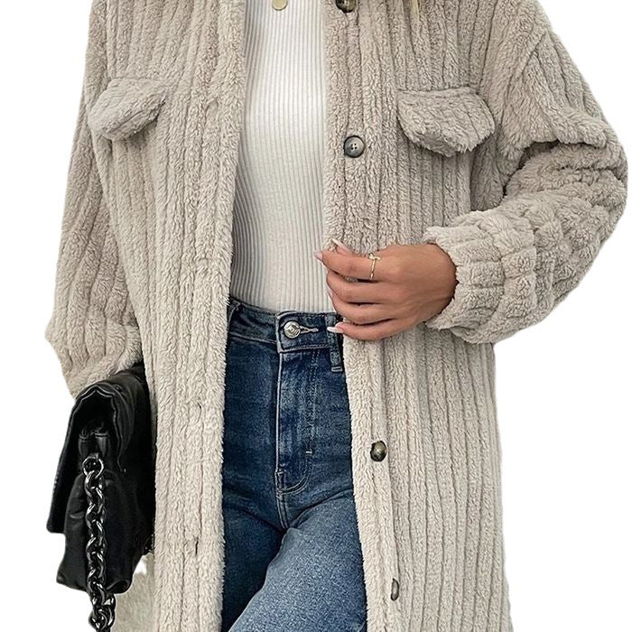 Dam fl fluffy långjacka med strukturerad design och påsydda fickor Mirla-Eva Jonsson
