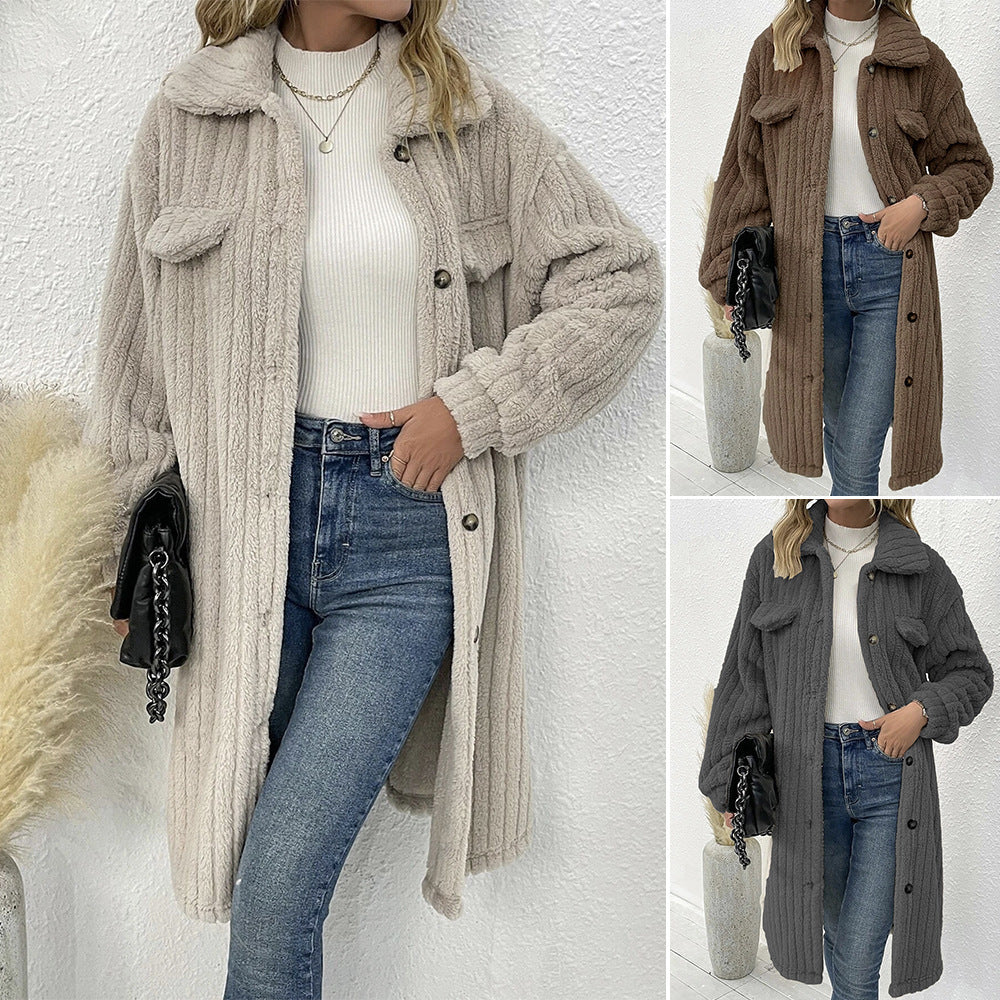 Dam fl fluffy långjacka med strukturerad design och påsydda fickor Mirla-Eva Jonsson