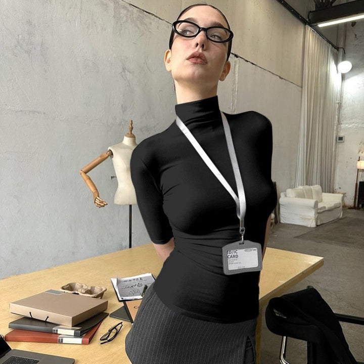 Dam högskuren figurformande kortärmad topp Mirla-Eva Jonsson