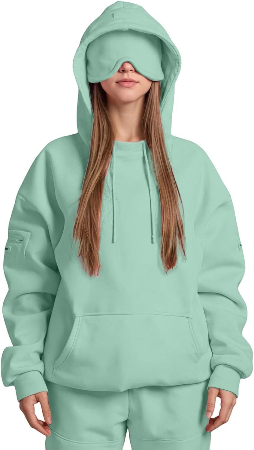 Dam hoodie med integrerad sovmaskdesign Mirla-Eva Jonsson