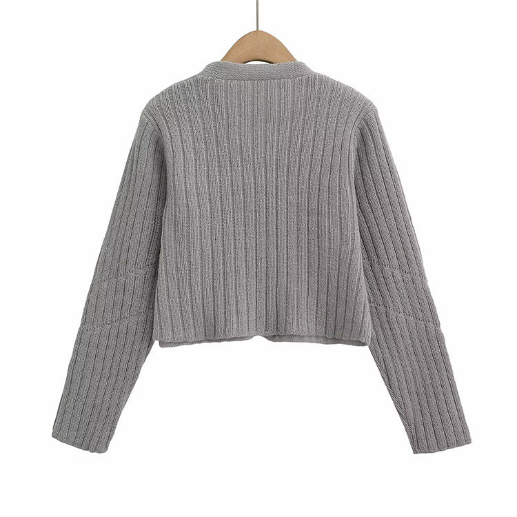 Dam kort stickad cardigan Mirla-Eva Jonsson