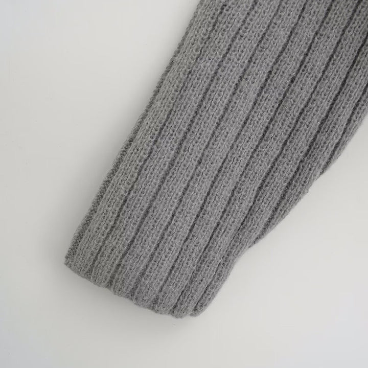 Dam kort stickad cardigan Mirla-Eva Jonsson