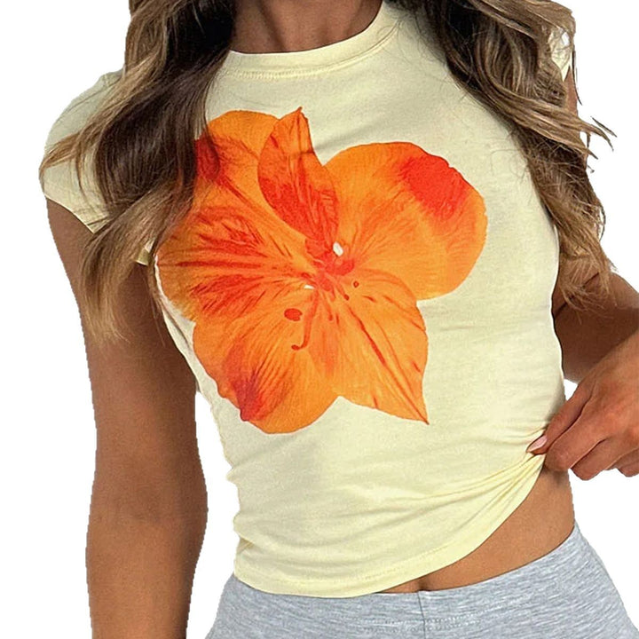 Dam kortärmad t-shirt med blommönster och figurnära passform Mirla-Eva Jonsson