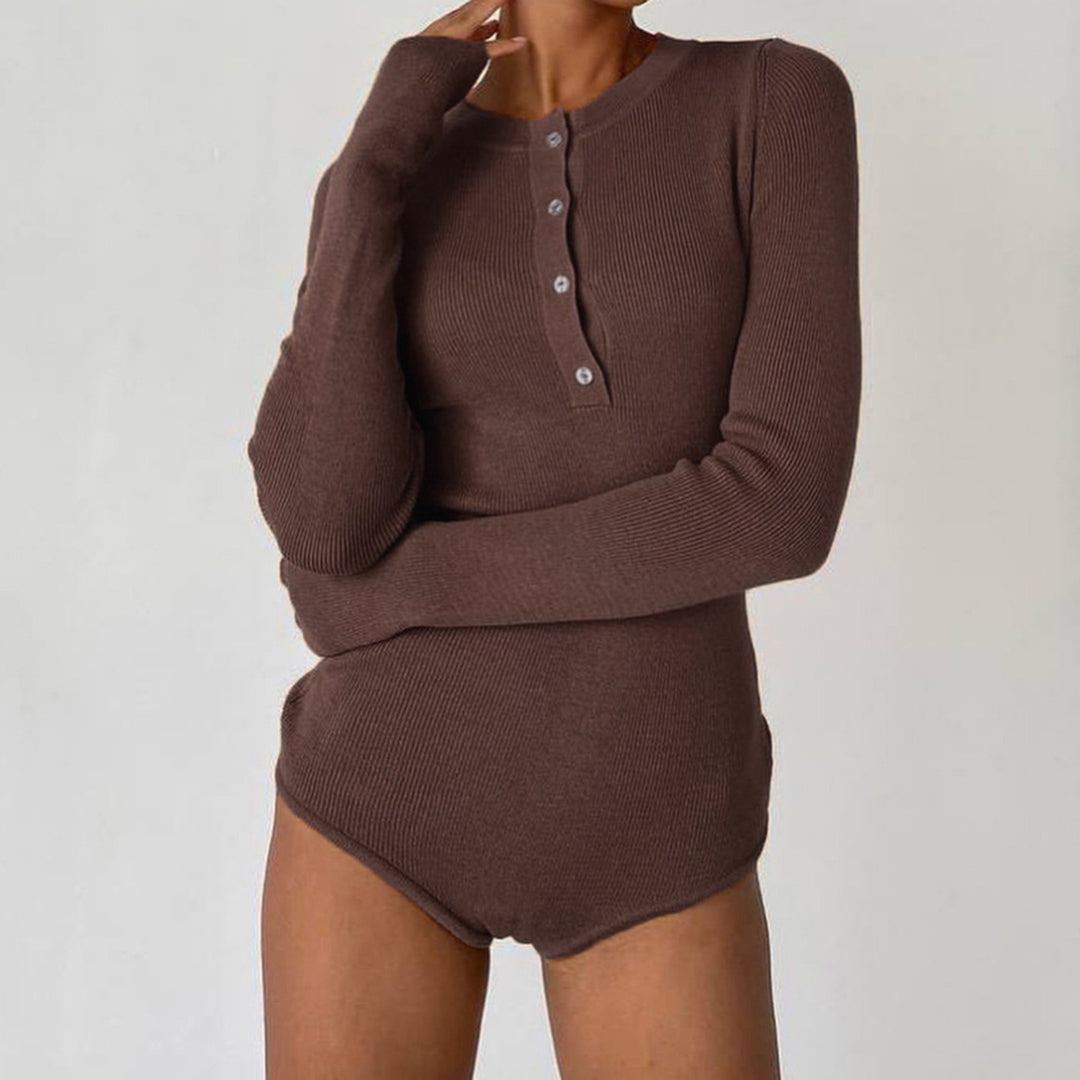 Dam långärmad bodysuit med knappslå och ribbstruktur Mirla-Eva Jonsson