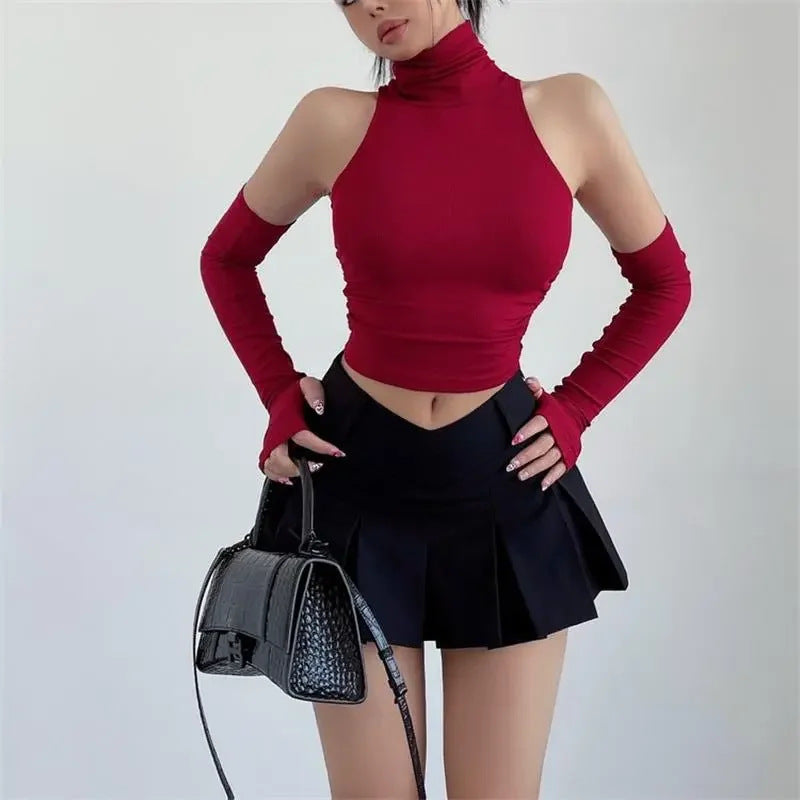 Dam långärmad crop-top med ståkrage och figurnära snitt Mirla-Eva Jonsson