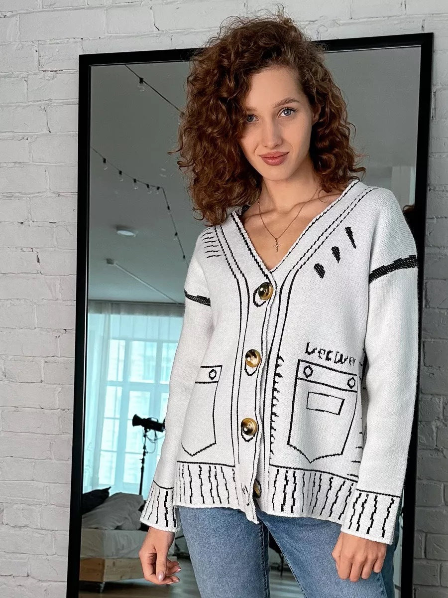Dam lös stickad kofta med utsökt design och stora knappar Mirla-Eva Jonsson