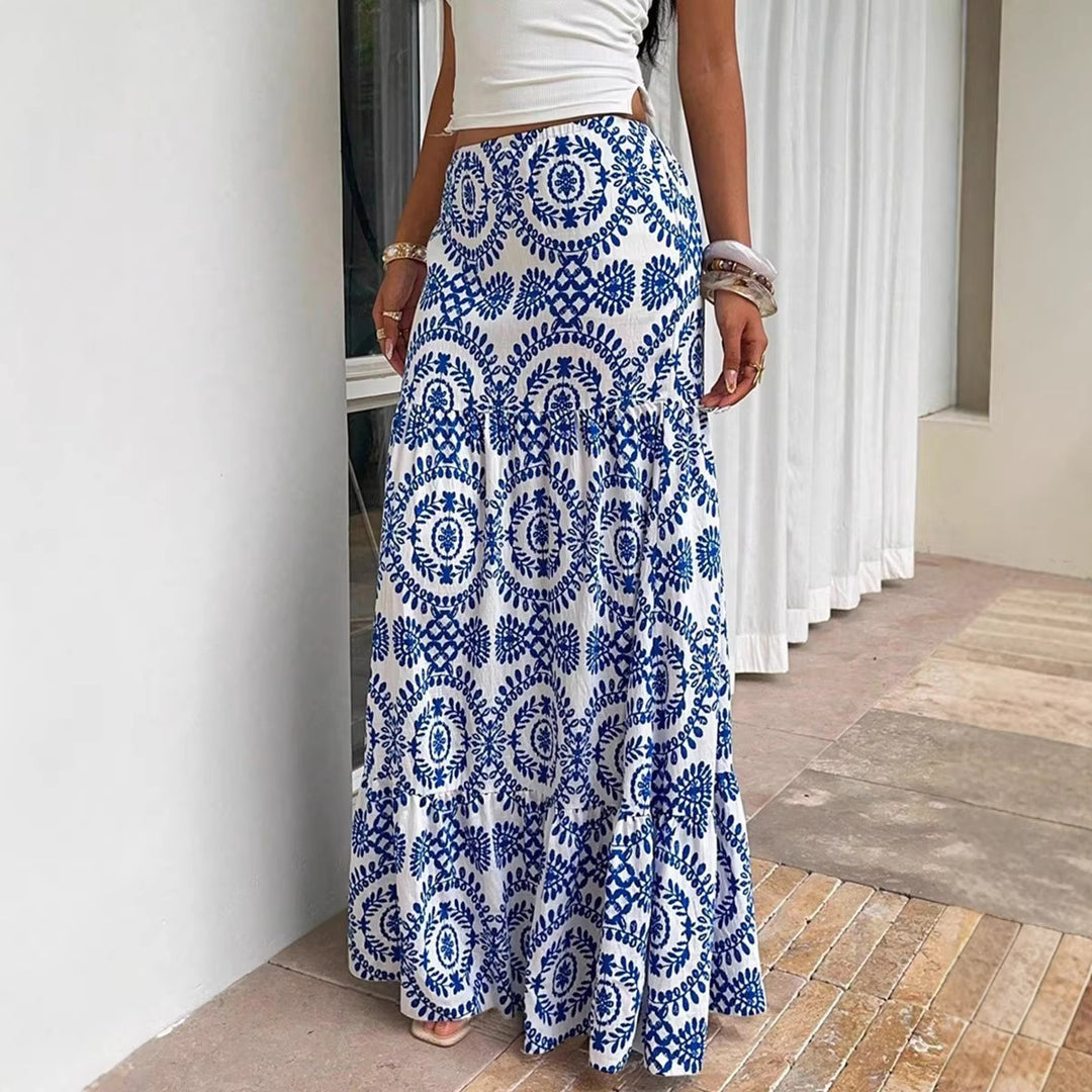 Dam maxi skirt with floral pattern and ruffle Mirla-Eva Jonsson