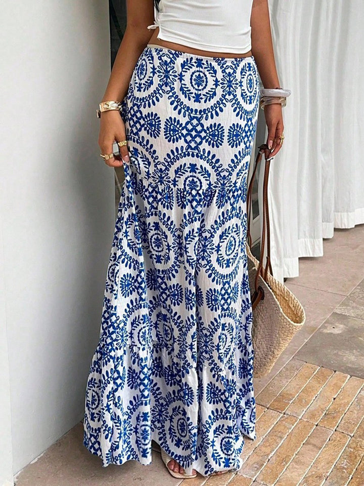 Dam maxi skirt with floral pattern and ruffle Mirla-Eva Jonsson