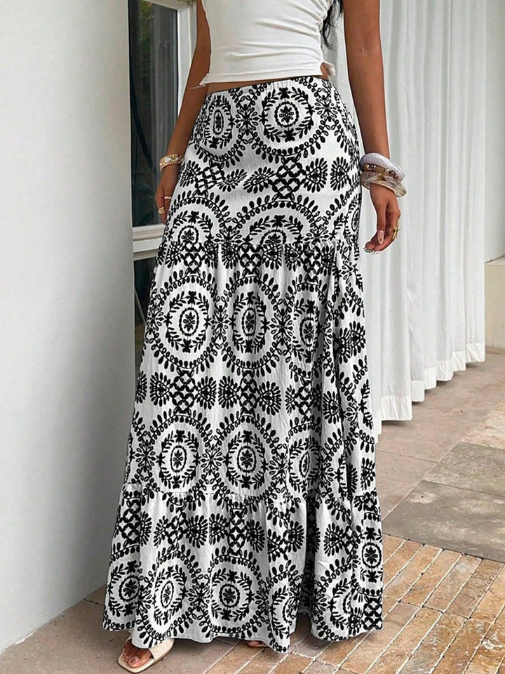 Dam maxi skirt with floral pattern and ruffle Mirla-Eva Jonsson