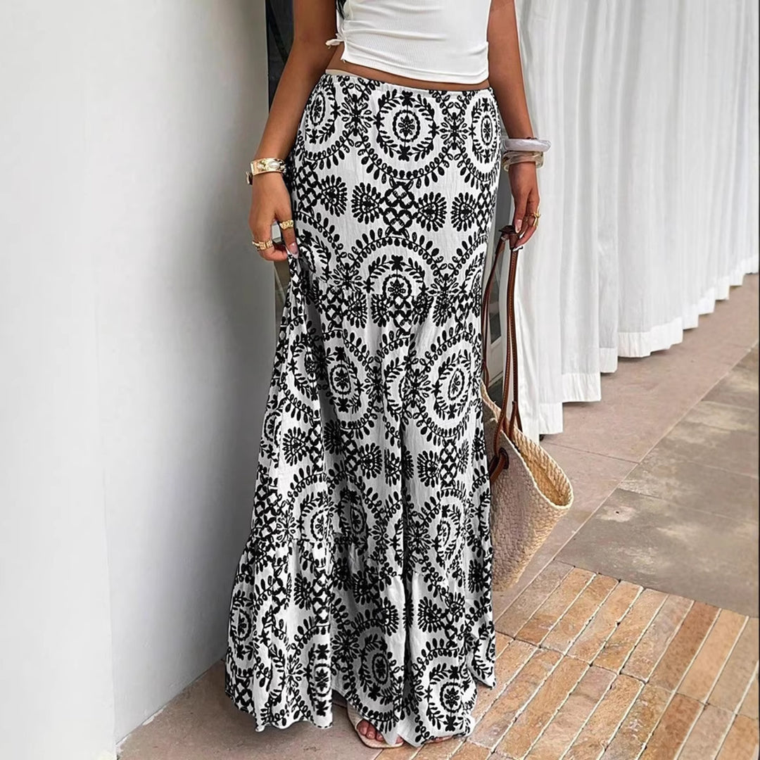Dam maxi skirt with floral pattern and ruffle Mirla-Eva Jonsson