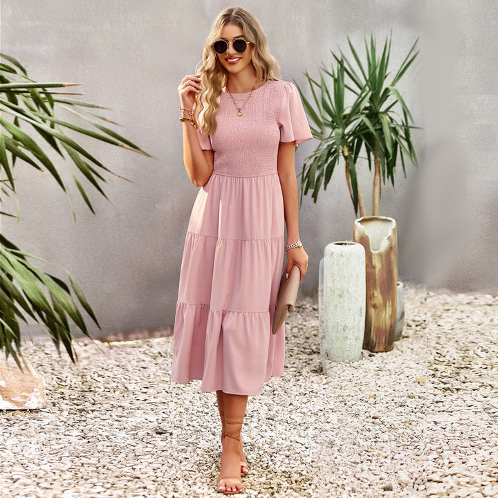 Dam midi dress med svängande volangkant och elastisk överdel Mirla-Eva Jonsson