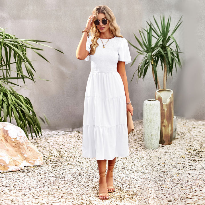 Dam midi dress med svängande volangkant och elastisk överdel Mirla-Eva Jonsson