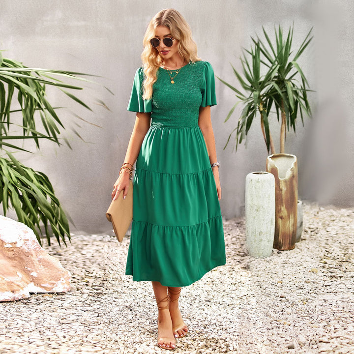 Dam midi dress med svängande volangkant och elastisk överdel Mirla-Eva Jonsson