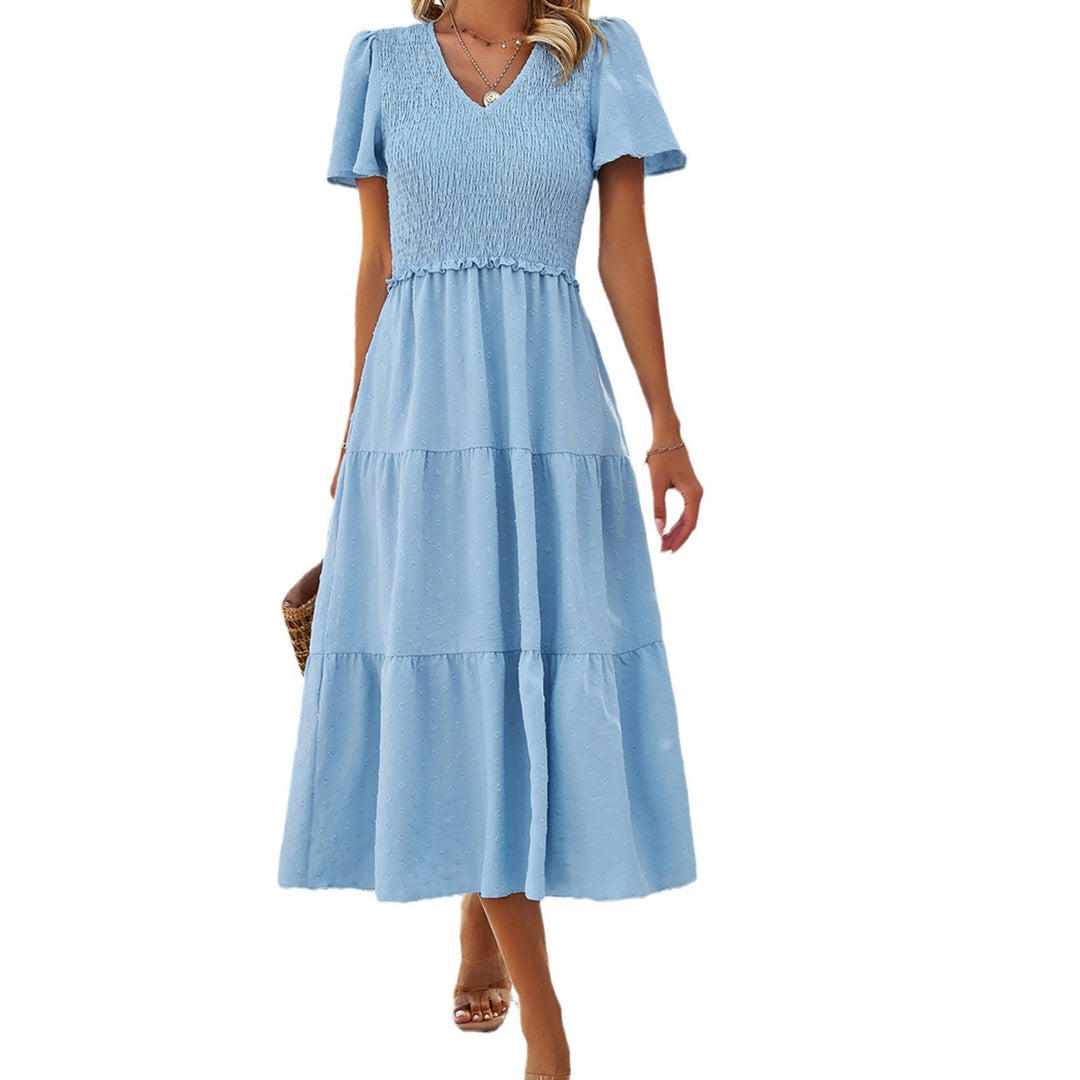 Dam midi dress with ruffle details and polka dots Mirla-Eva Jonsson