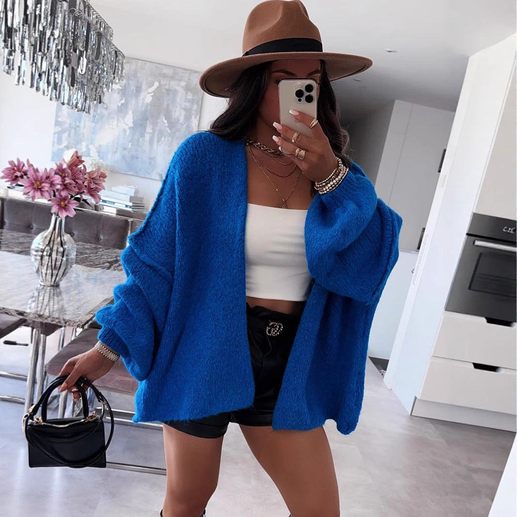 Dam oversized stickad jacka med avslappnade ballongärmar och strukturerat material Mirla-Eva Jonsson