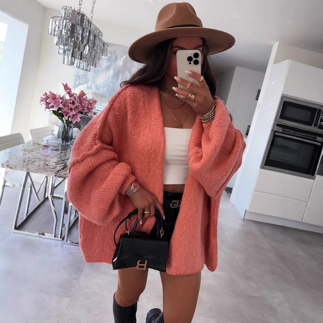 Dam oversized stickad jacka med avslappnade ballongärmar och strukturerat material Mirla-Eva Jonsson