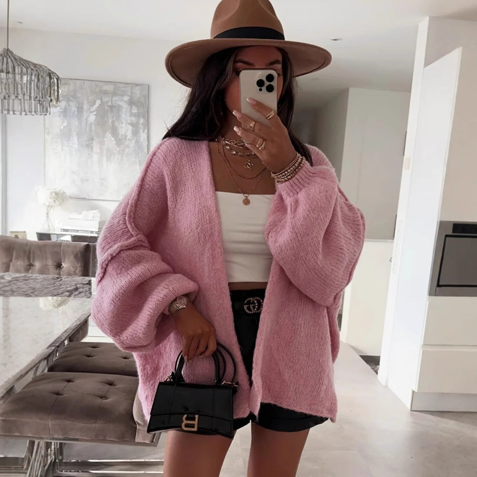 Dam oversized stickad jacka med avslappnade ballongärmar och strukturerat material Mirla-Eva Jonsson