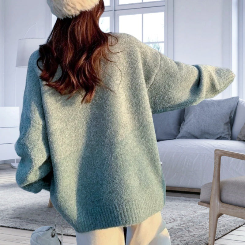 Dam oversized stickad tröja med elegant V-hals och sidofrekvenser Mirla-Eva Jonsson