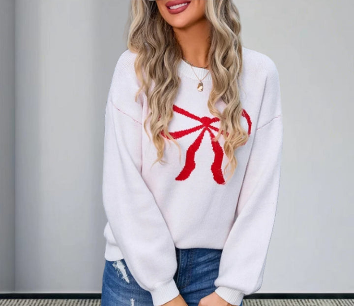 Dam stricktröja med charmigt slingmönster och modiska detaljer Eva Jonsson-Eva Jonsson