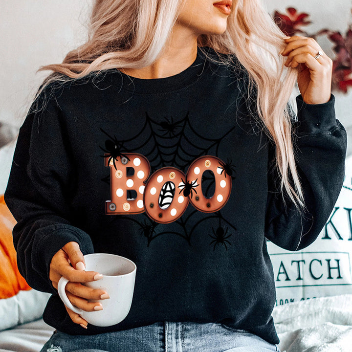 Dam sweatshirt med kreativ Halloween spindelnätsdesign Mirla-Eva Jonsson