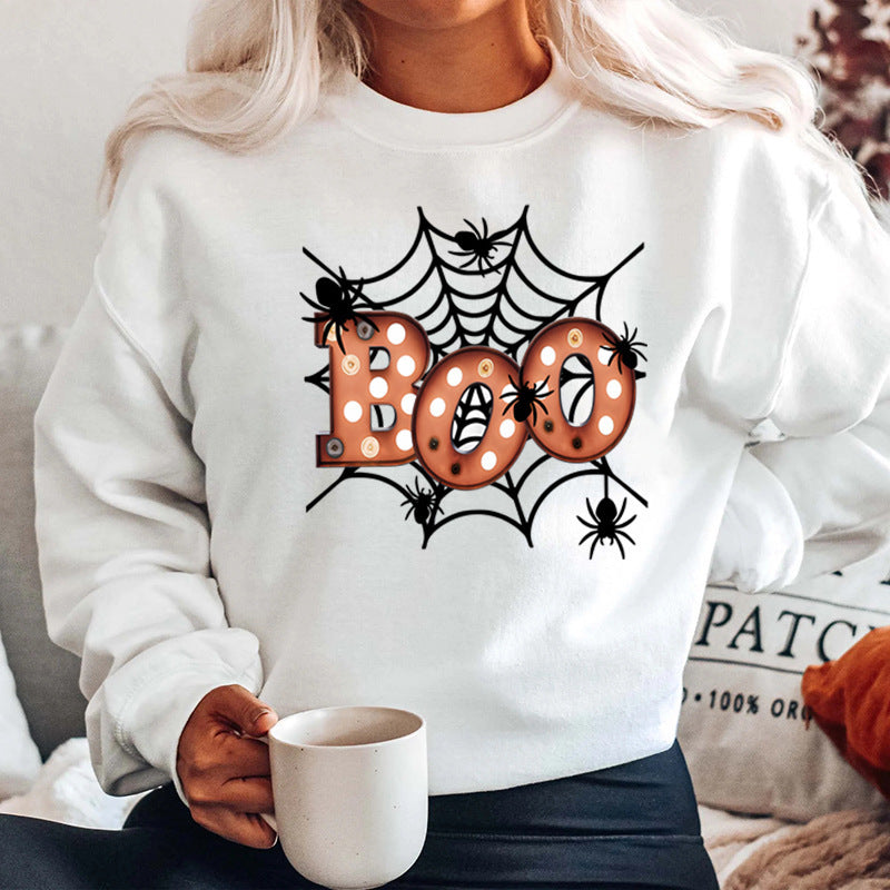 Dam sweatshirt med kreativ Halloween spindelnätsdesign Mirla-Eva Jonsson