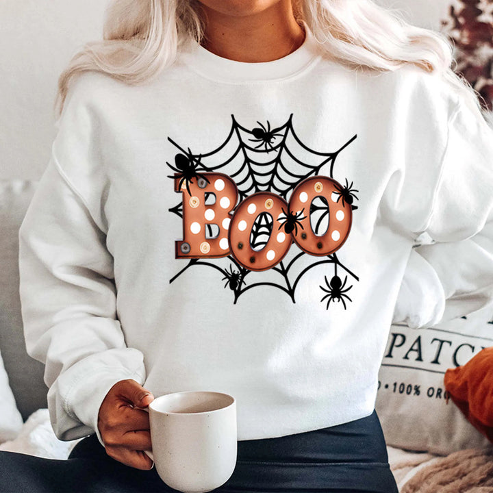 Dam sweatshirt med kreativ Halloween spindelnätsdesign Mirla-Eva Jonsson