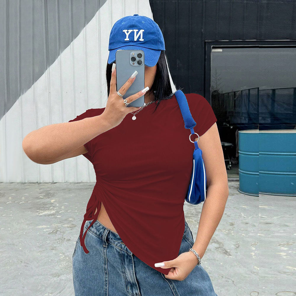 Dam t-shirt med sidoredskap och asymmetrisk skärning Mirla-Eva Jonsson