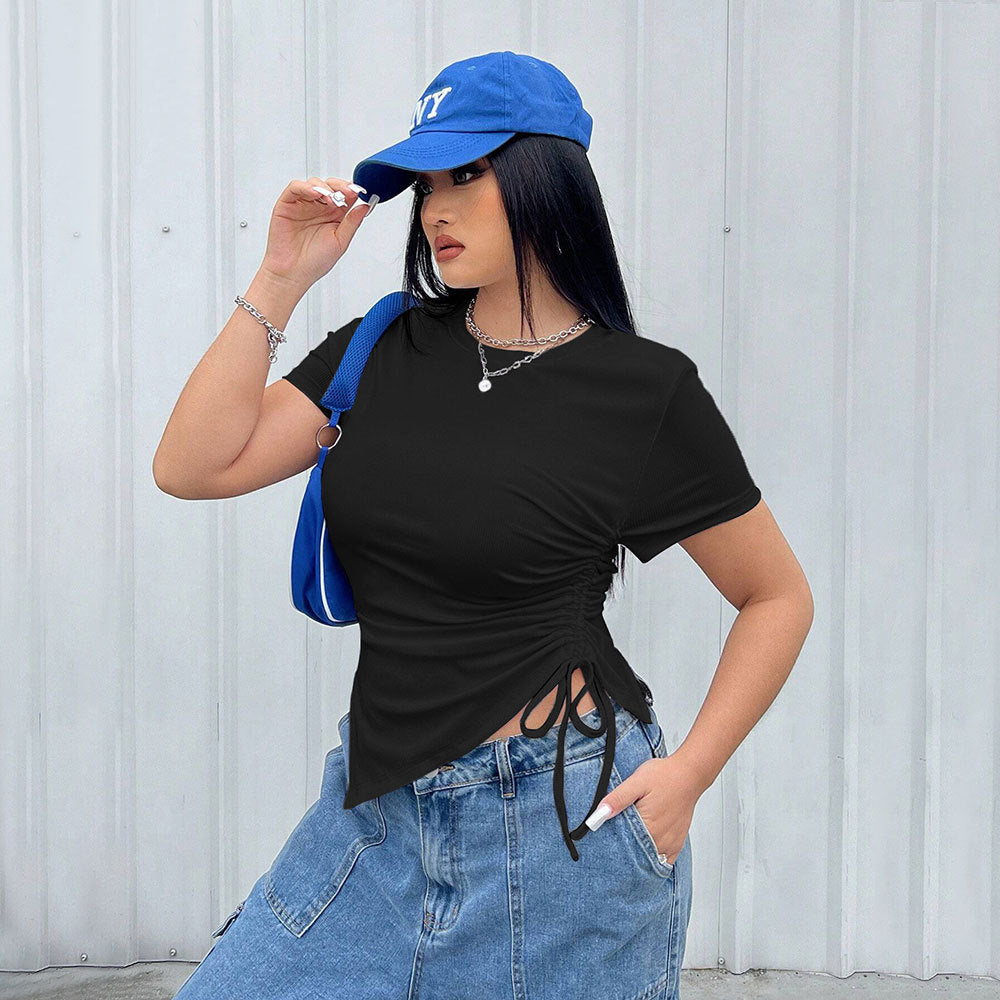 Dam t-shirt med sidoredskap och asymmetrisk skärning Mirla-Eva Jonsson