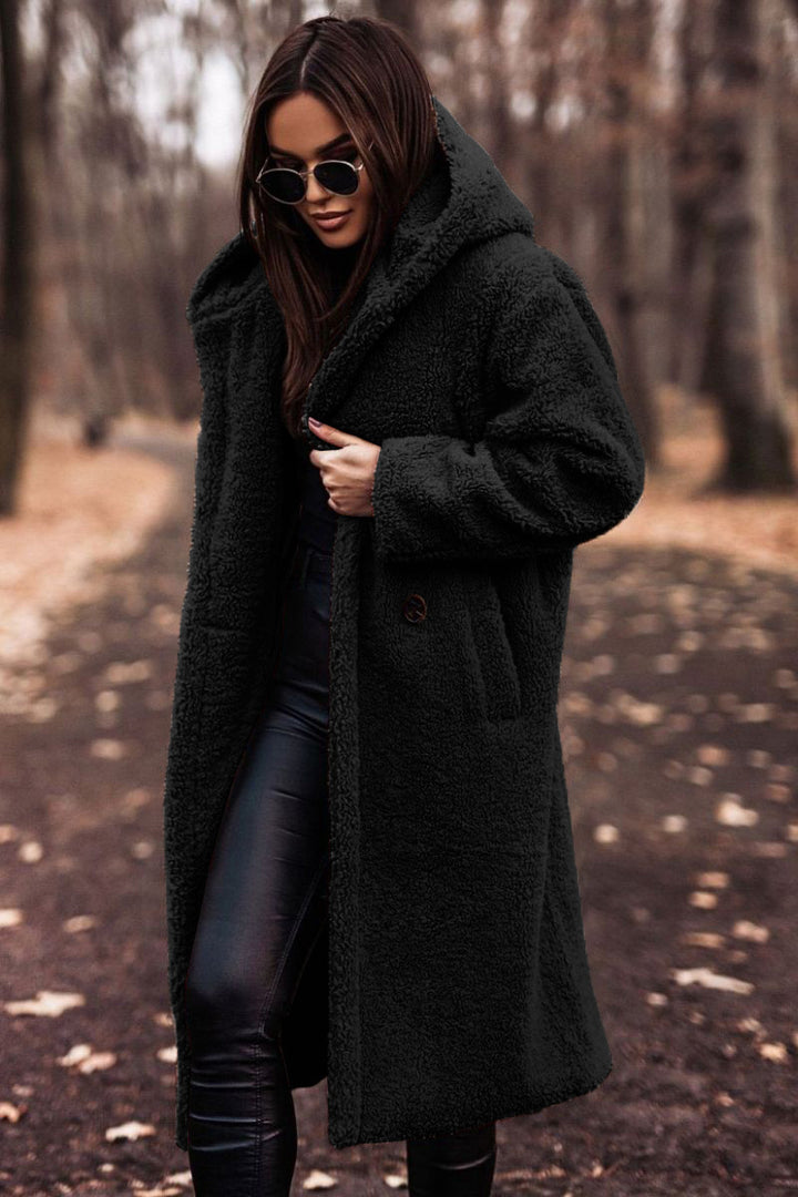 Dam-teddy-fleece-kappa med generös huva och praktiska sidofickor Mirla-Eva Jonsson