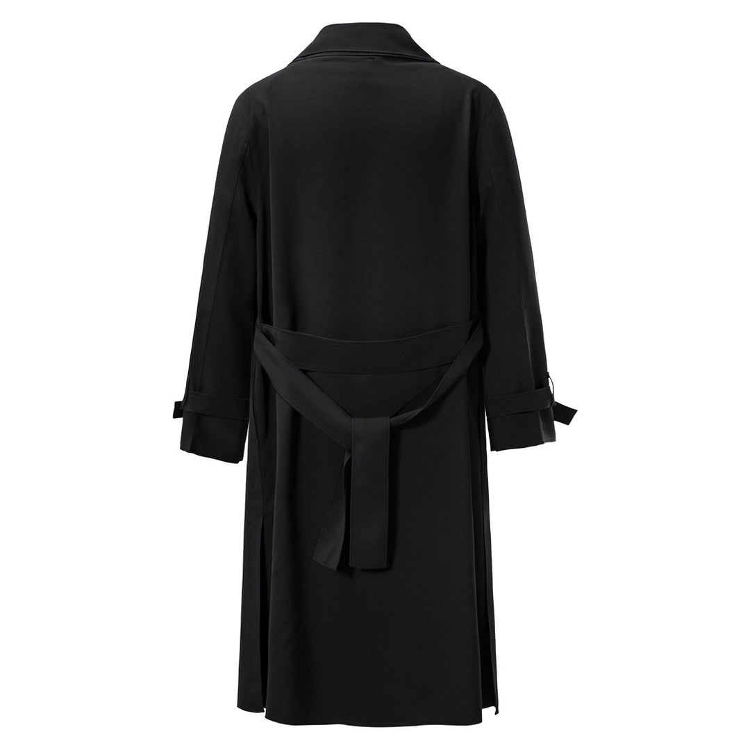 Dam trenchcoat med asymmetrisk reversdesign och praktiska justerbara ärmar Eva Jonsson-Eva Jonsson