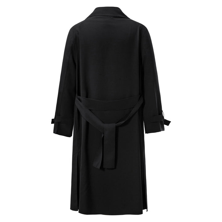 Dam trenchcoat med asymmetrisk reversdesign och praktiska justerbara ärmar Eva Jonsson-Eva Jonsson